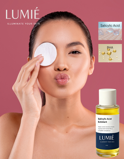 Woman applying skincare product with LUMié exfoliant and ingredients displayed on a pink background